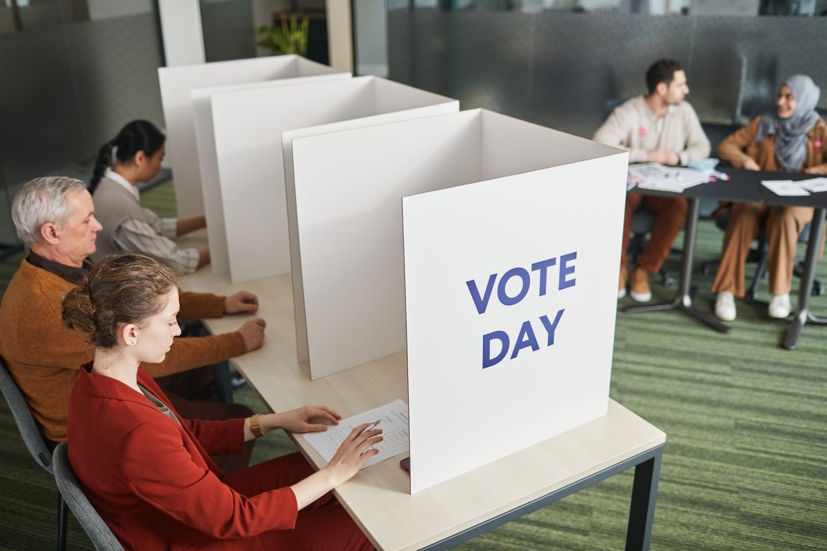 Voters lining up at voting booths on election day